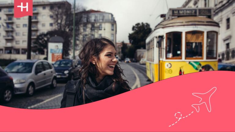 A young woman smiling while visiting Portugal. Coliving in Portugal.