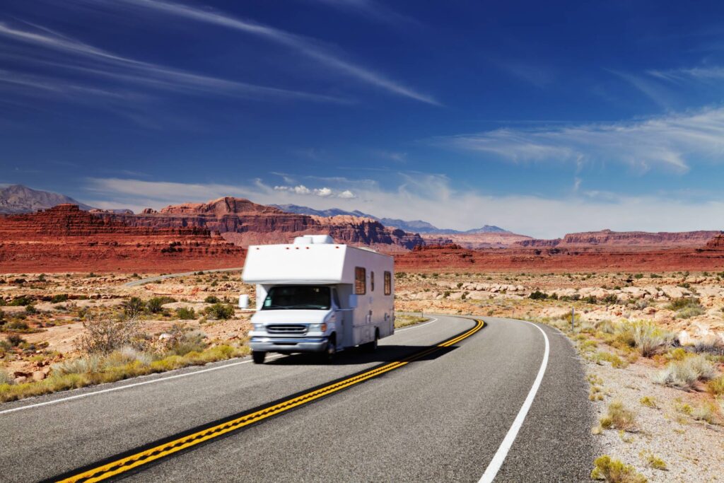 RV traveling around the desert in a sunny day