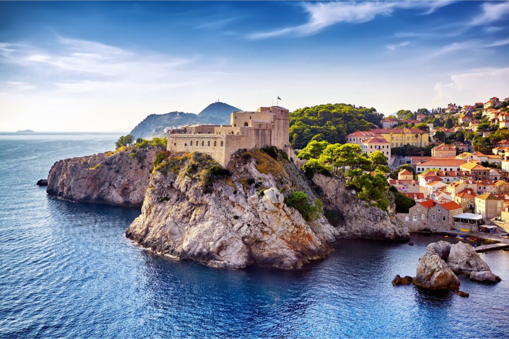 Dubrovnik from the air and the surrounding ocean and mountains.