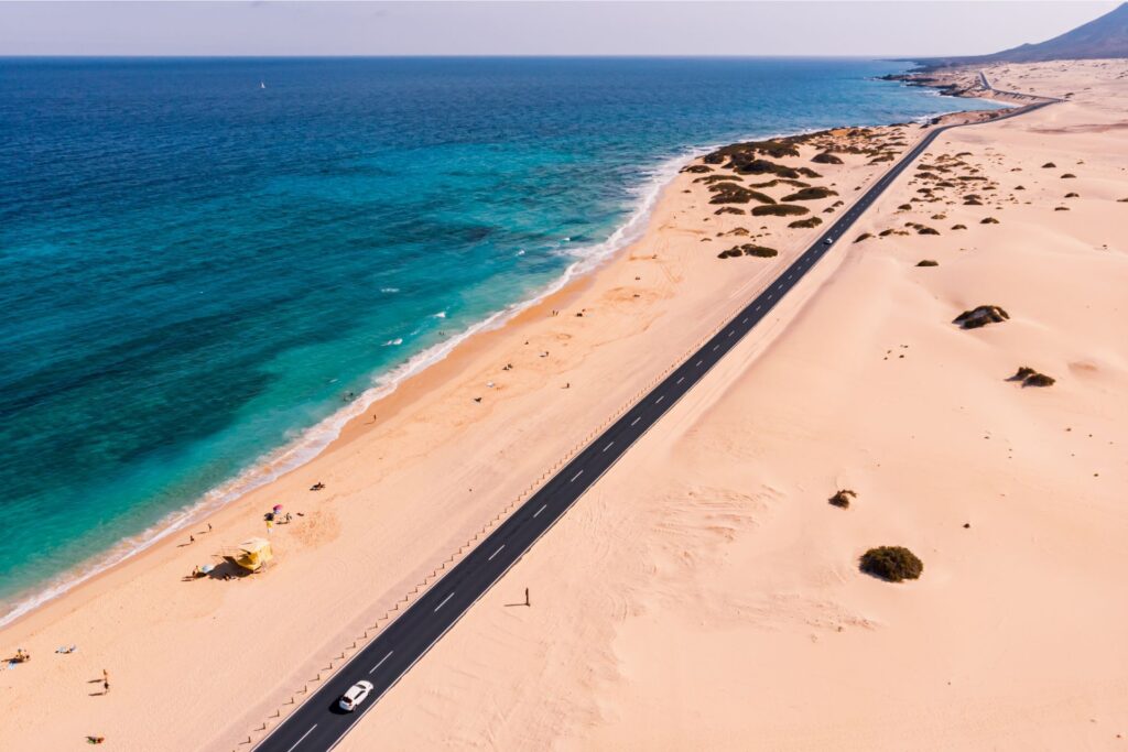 Aerial view of the ocean and the parallel main road in Fuerteventura.