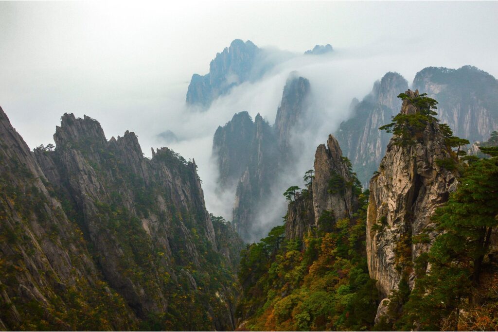Aerial view of the peaks of Huangshan and surrounding clouds.