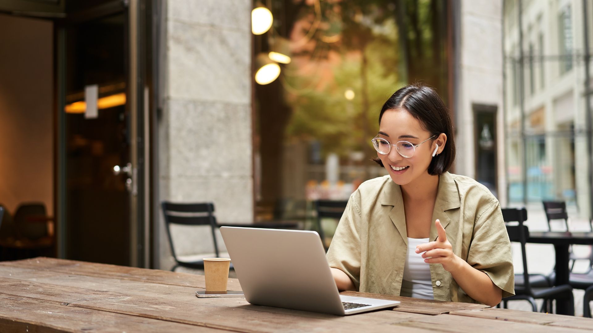 A woman at her laptop in one of the best cities for remote work