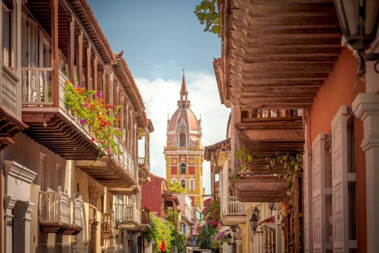 View of a street with colonial buildings in Cartagena's Old Town.