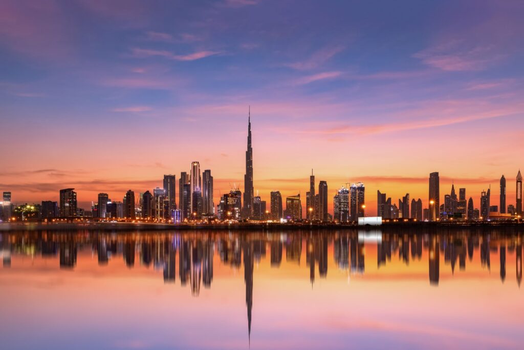 The Dubai skyline at dusk.