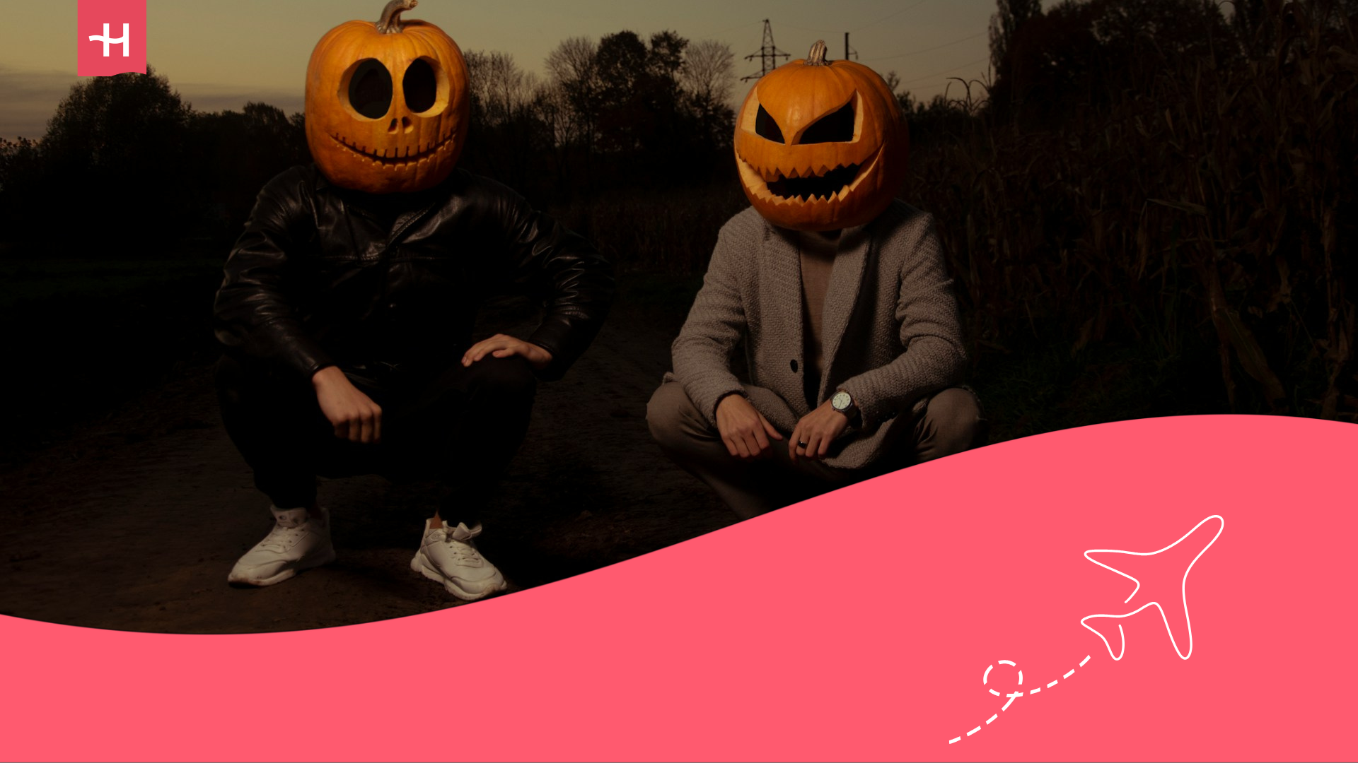 Halloween party, two people wearing pumpkin heads
