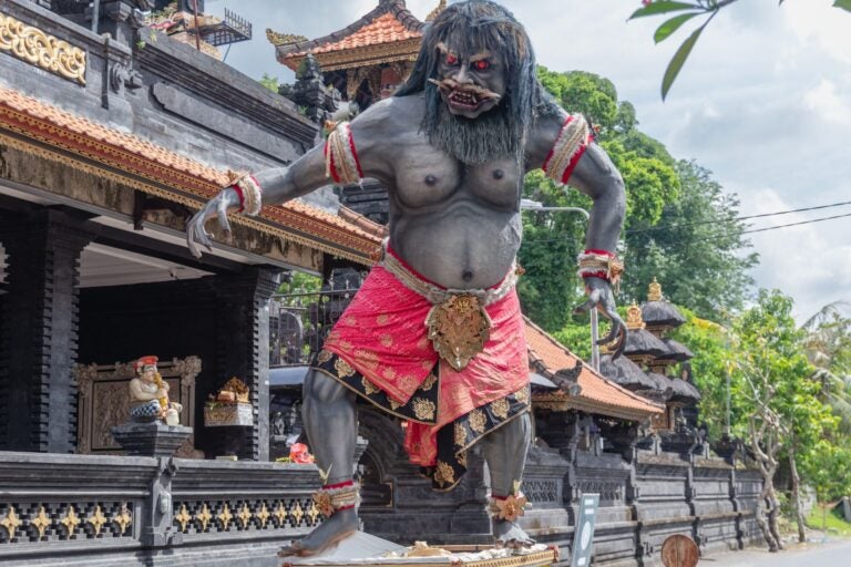 Ogoh-Ogoh parade in Bali featuring giant, colorful effigies during the eve of Nyepi.