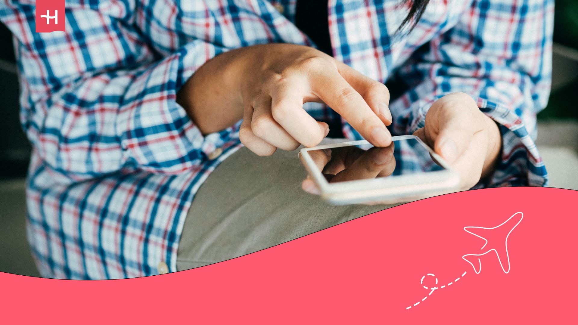 student browsing on a mobile phone - best apps for international students
