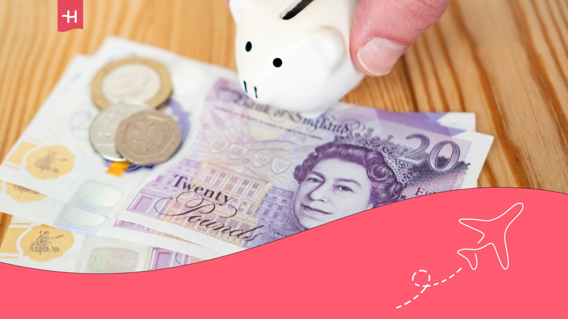 English banknotes and a piggy bank