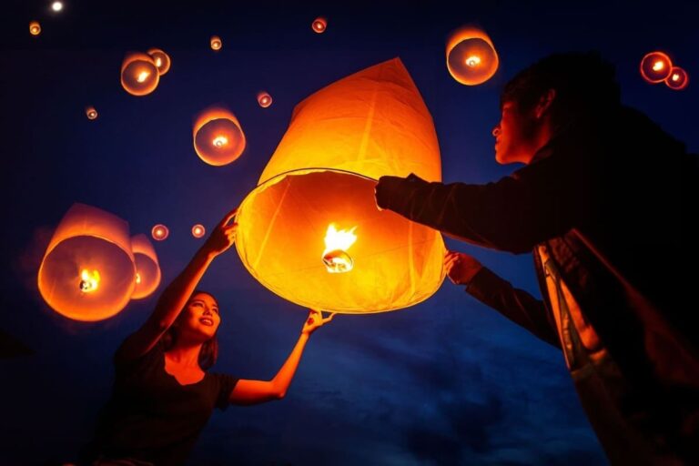 Couple holding a lantern together