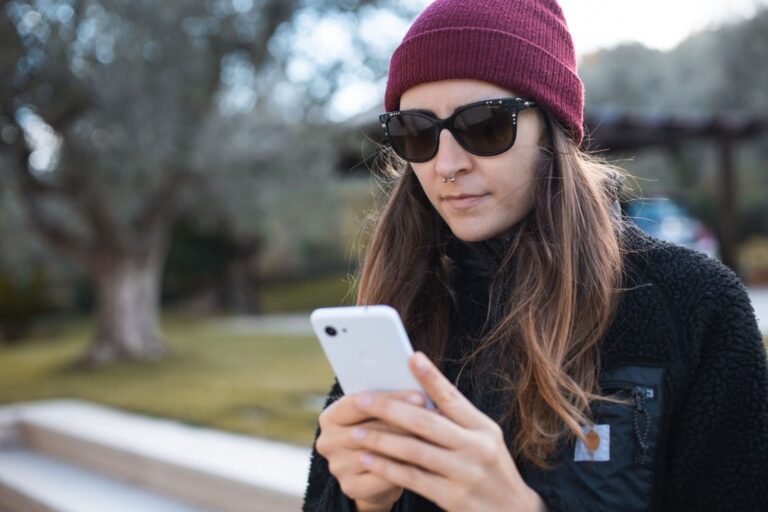woman holding Google Pixel
