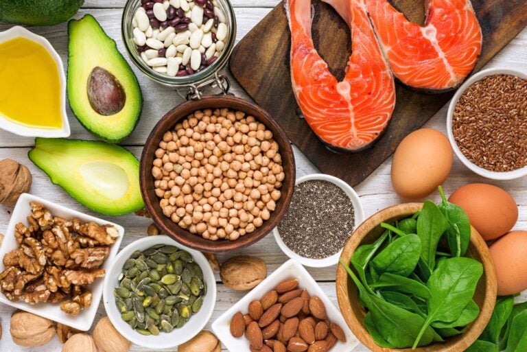 a variety of foods that contain healthy fats