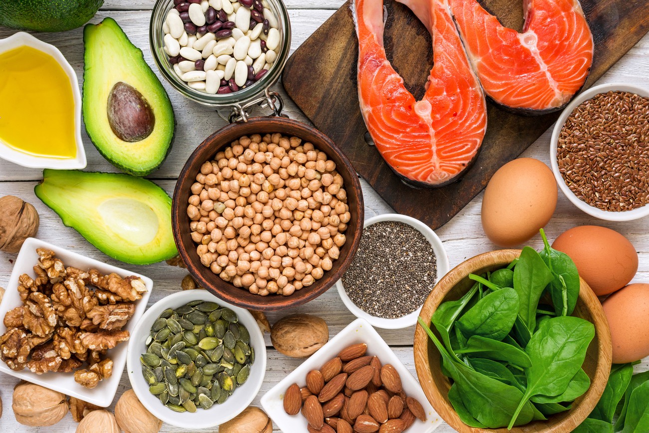 a variety of foods that contain healthy fats