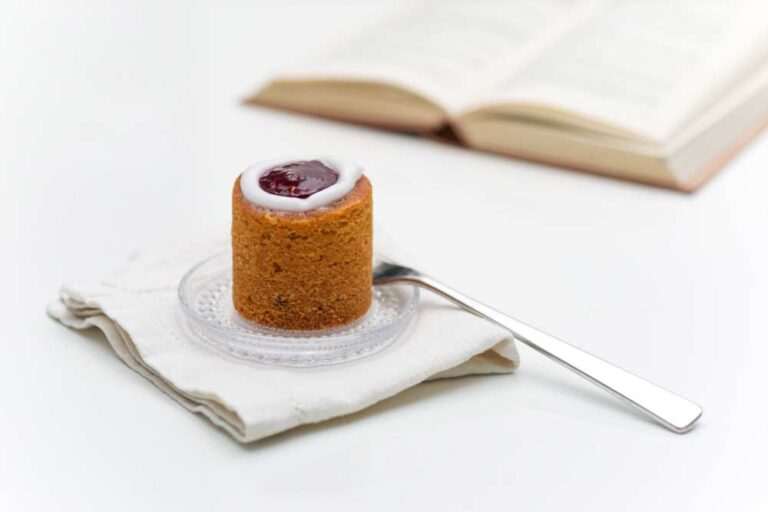 A Finnish fika runeberg tart on a tiny plate