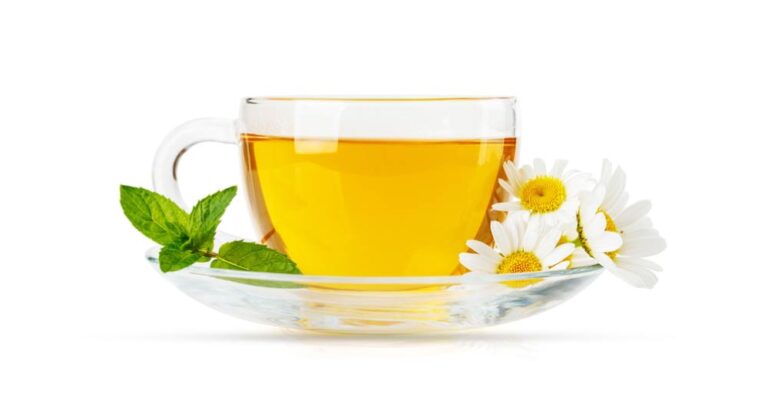 Herbal tea in a glass tea cup