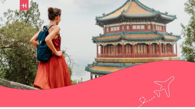 Female traveller admiring the ancient Chinese temple in Beijing.
