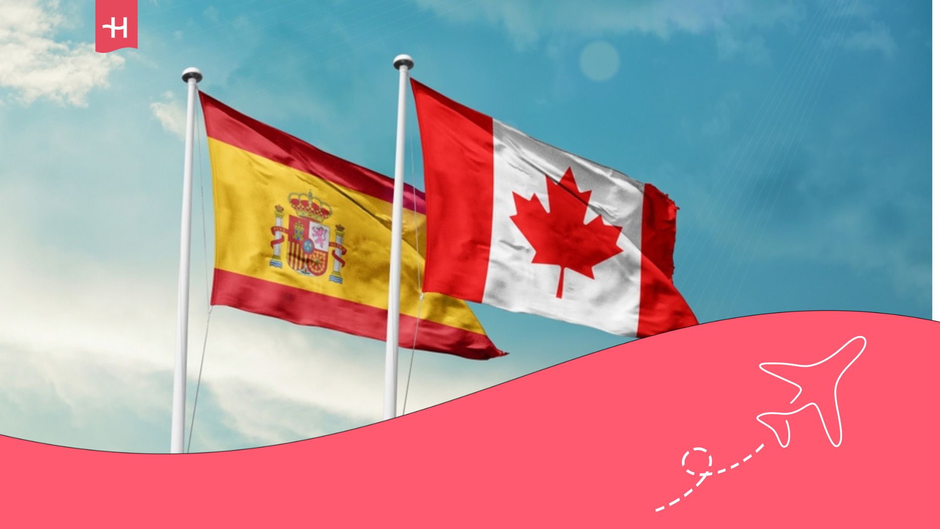 Flags of Canada and Spain flying in the blue sky.