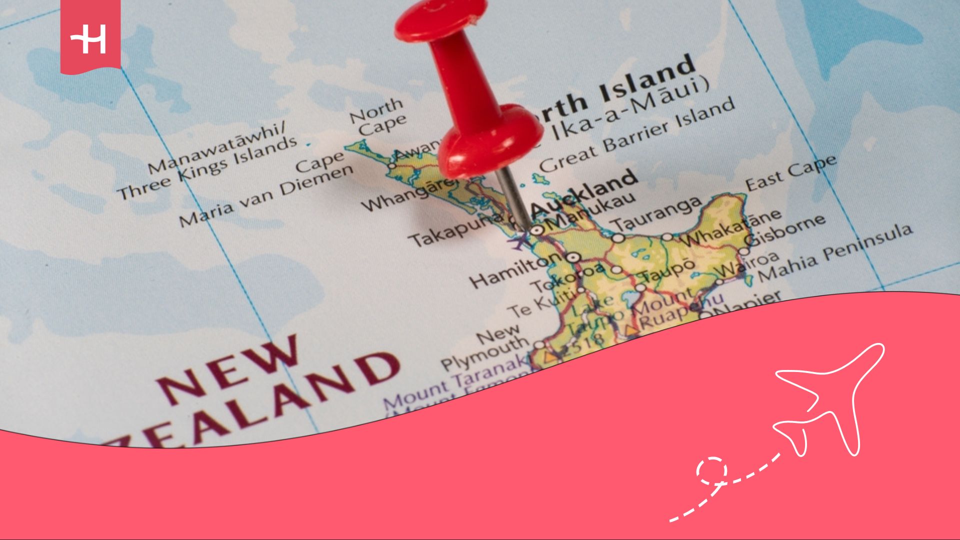 Map of New Zealand with a pin stuck in it.