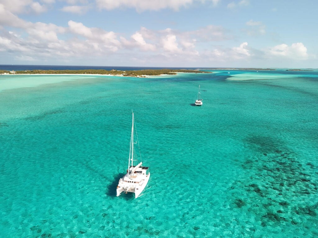 Remote Bahamas Island With Sailboats