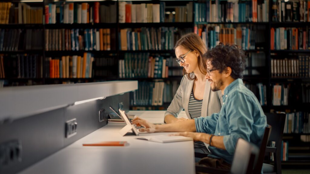 students at the library for college study using creative apps