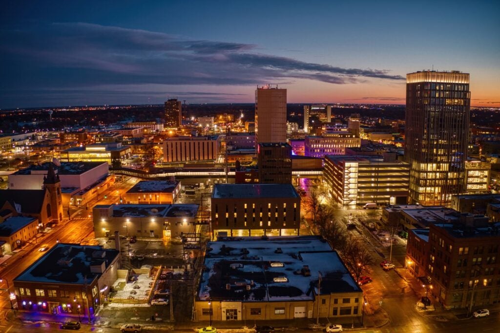 Aerial view of Fargo skyline at dusk.