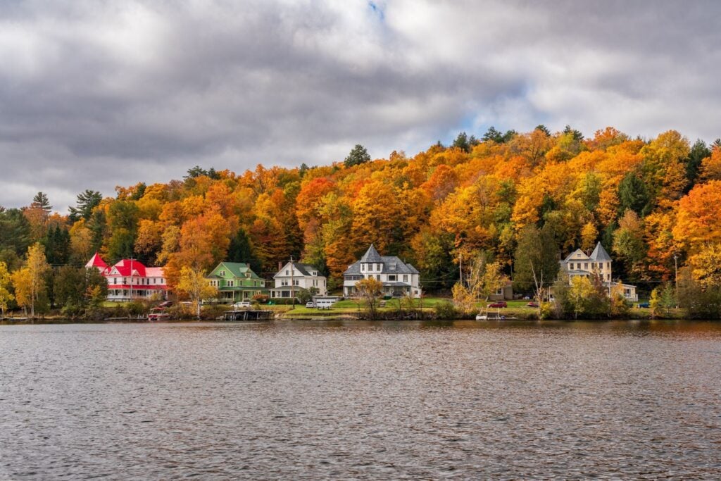Large homes along the lakeside at Saranac Lake