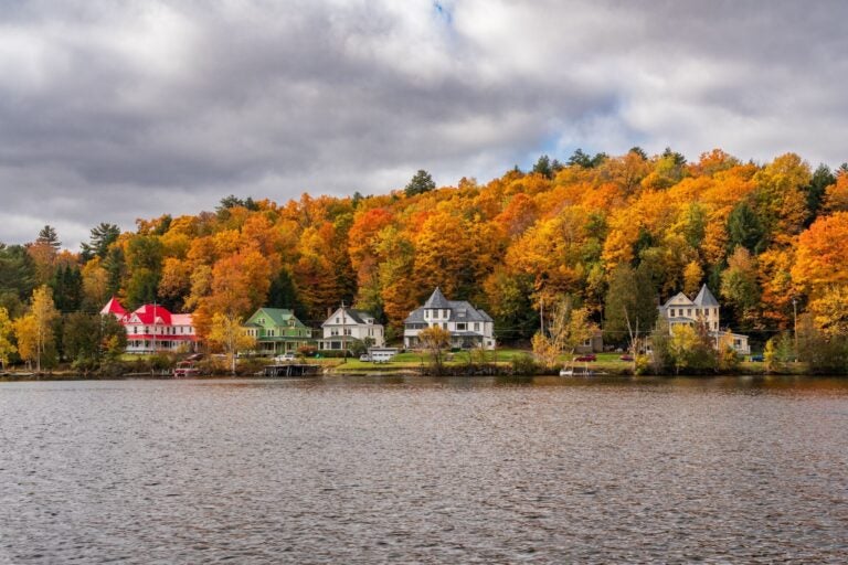 Large homes along the lakeside at Saranac Lake
