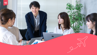 Digital nomads sharing a common area in a co-living space in Tokyo.