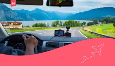 Person driving a car on a road in Switzerland.