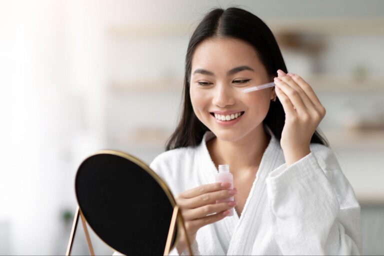 young Korean women using Korean beauty products