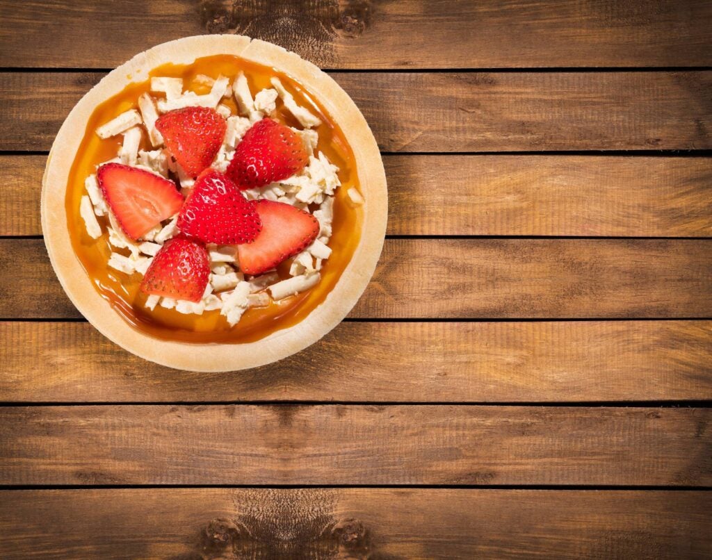 local oblea, or wafer, served with strawberries, cheese, and condensed milk