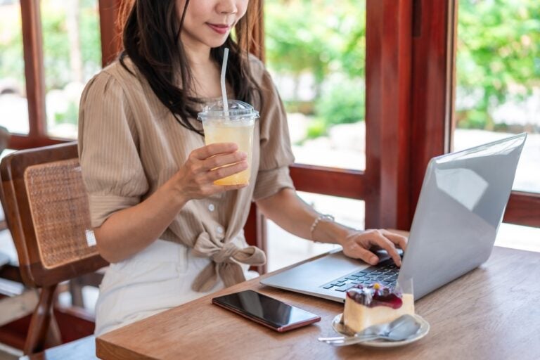 attending a virtual networking meeting on a laptop