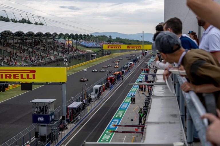 Formula 1 cars racing at the Hungaroring during the Hungarian Grand Prix in Mogyorod