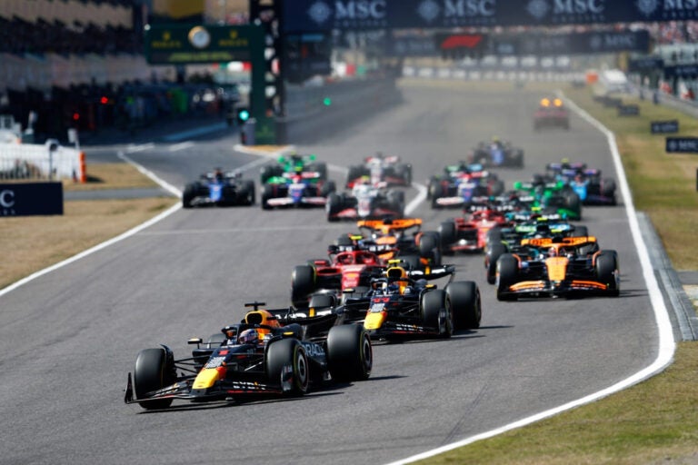 Start of the Formula 1 Japanese Grand Prix at Suzuka Circuit with cars heading into the first corner