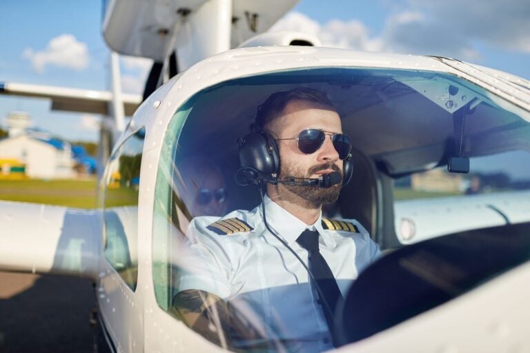 male pilot in the cockpit - best flight schools in australia