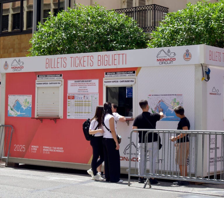 Formula 1 fans buying tickets at the official Monaco Grand Prix ticket office in Monte Carlo