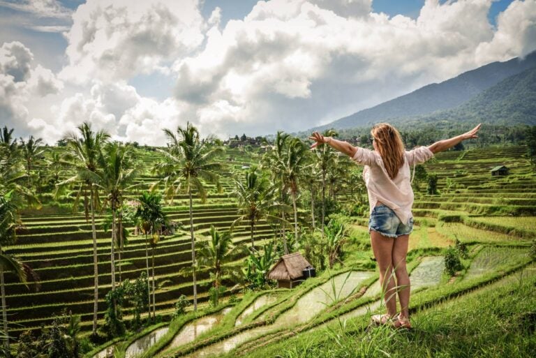 woman walking in the tegallalang rice terraces