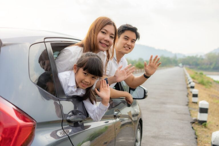 A family exploring Costa Rica in a rented SUV.