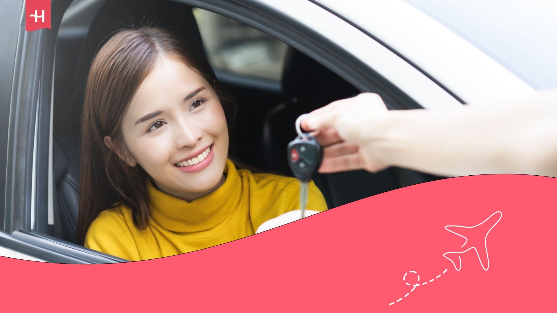 A happy customer receiving the key to her car rental in Italy.