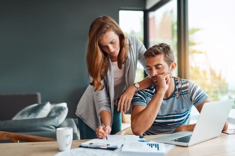  An international student in the UK applying for loans online with help from his guardian.
