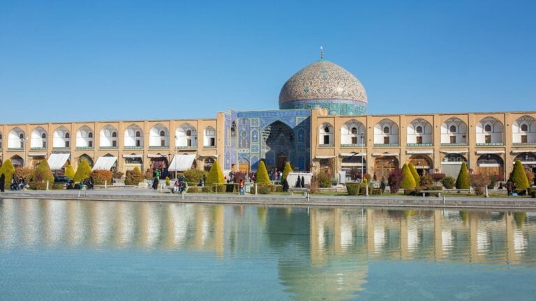 The city of Isfahan, showing a mosque by the water