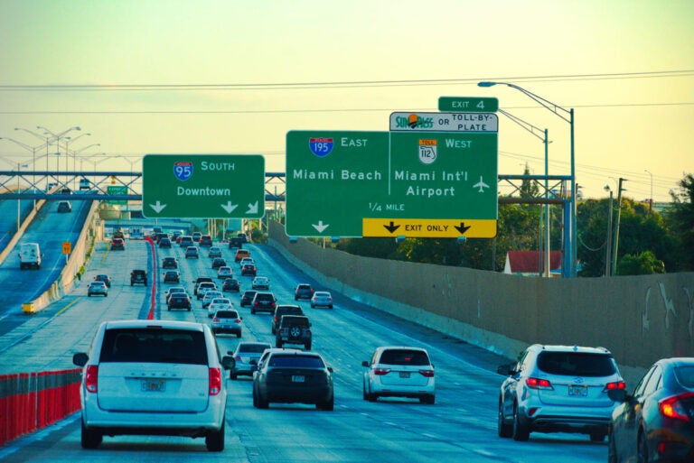 Miami highway sign showing directions toward Orlando and Miami Beach in Florida