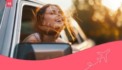 woman enjoying a road trip - Best car rental at Pisa airport