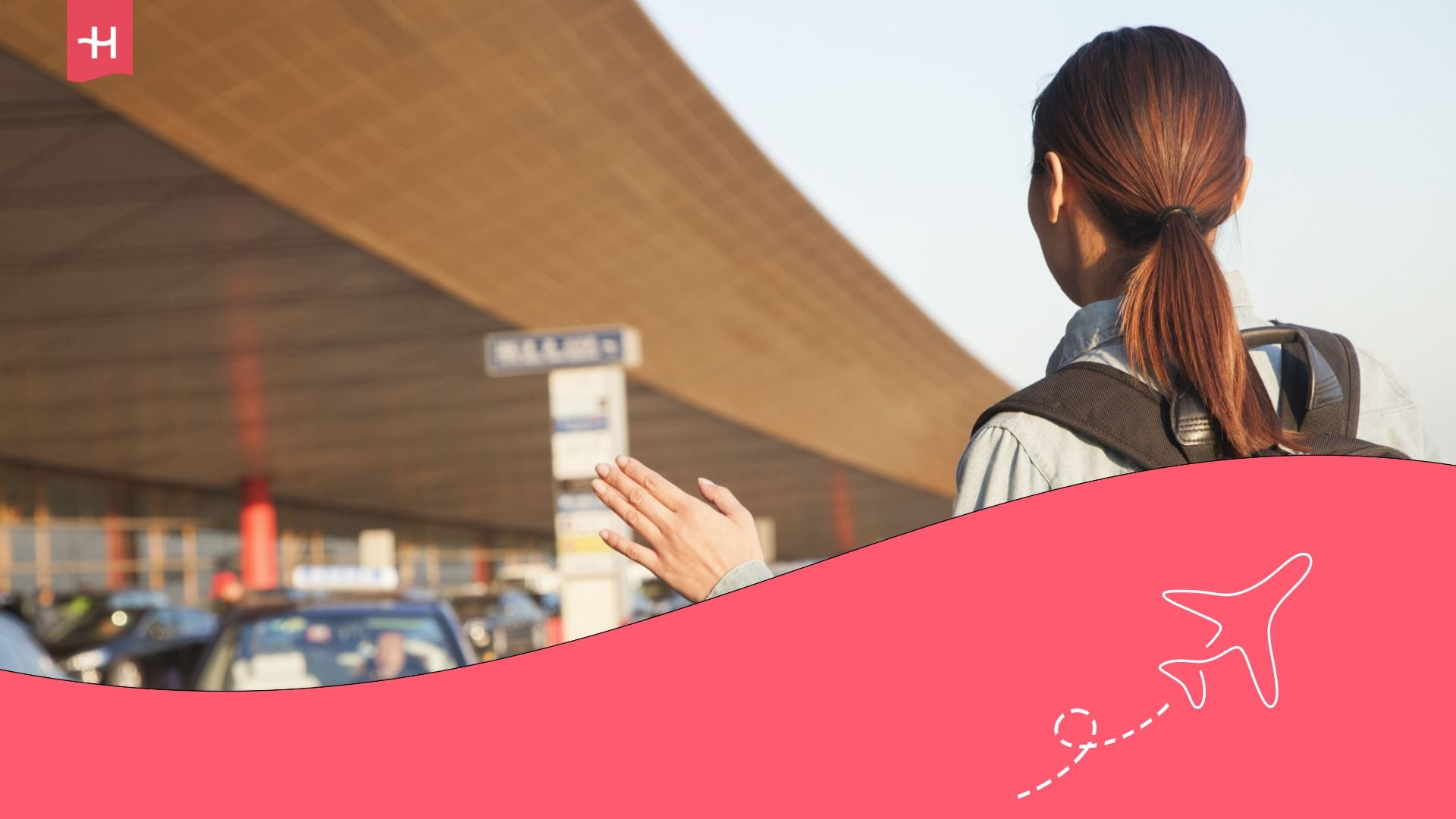 A woman being picked up by a shuttle to the car rental office near the airport.