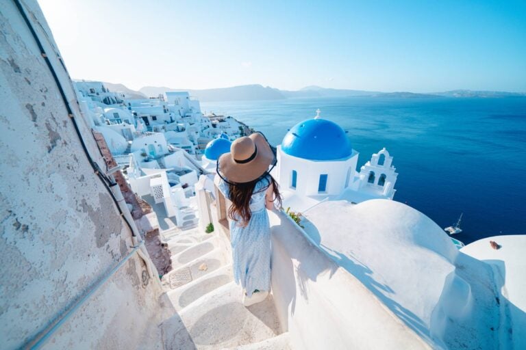 woman watching the blue scenery at mykonos