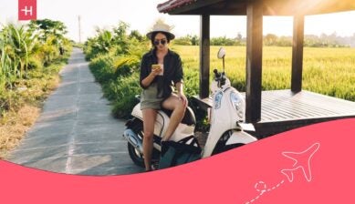 girl on a moped, checking maps on her phone - how much is 1 gb of data