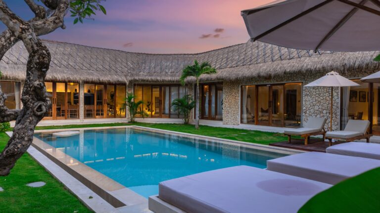 Private pool villa surrounded by lush tropical garden in Seminyak, Bali
