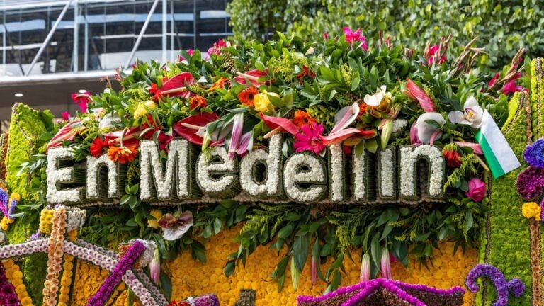 A floral display spelling out En Medellín during the Feria de las Flores