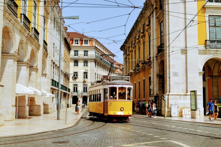 Modern tram system in Valencia running through urban streets