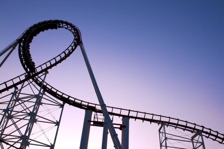 six flag rollecoaster during the sunset
