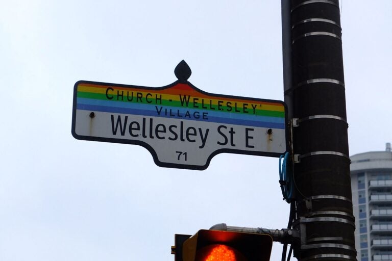Rainbow street sign in Toronto.